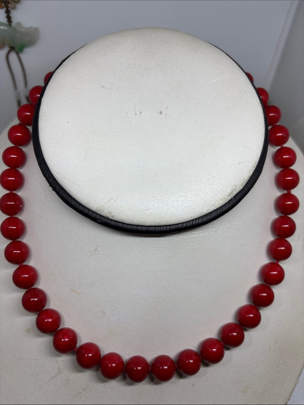 10mm Red mother of pearl Necklace. Hand knotted with 10mm gold filled clasp. 17”
